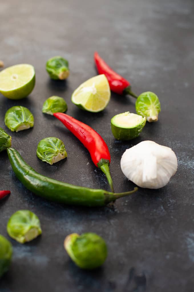 brussels sprouts, chili peppers, onions and limes