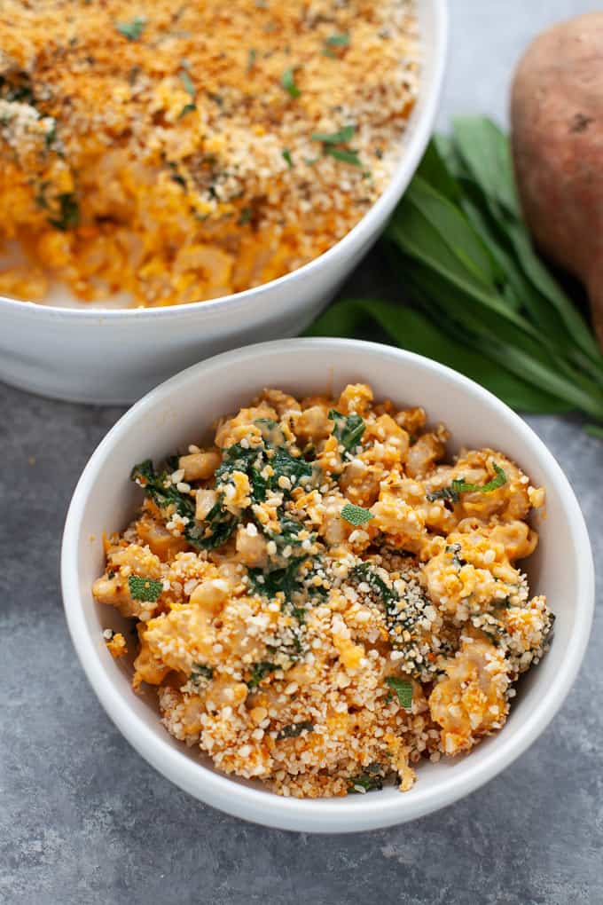 An inspired and elevated classic comfort food staple, this sweet potato mac and cheese with kale is packed with the sweet taste of sweet potato and the earthy, savory flavor of sage. Plus, the added veggies help make this a more balanced pasta dish! #macandcheese #sweetpotato #healthy