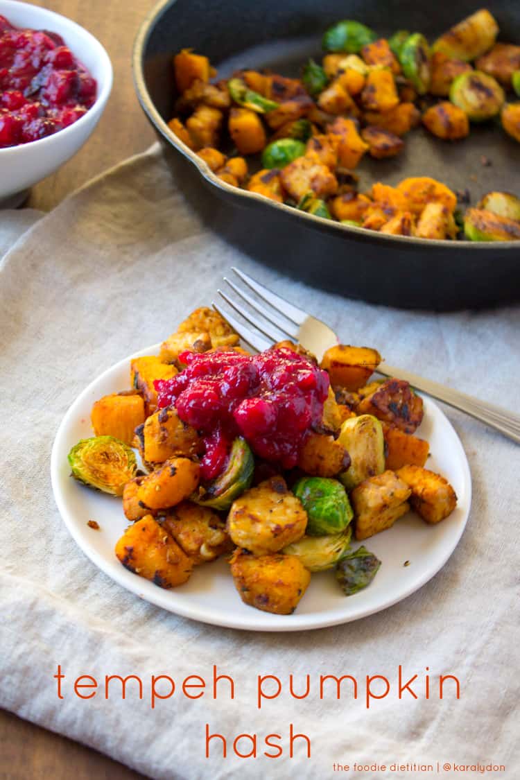 Use up all your Thanksgiving leftovers in this deliciously smokey and spicy tempeh pumpkin hash. Perfect as a savory breakfast or dinner for the day after Thanksgiving. The Foodie Dietitian | @karalydon