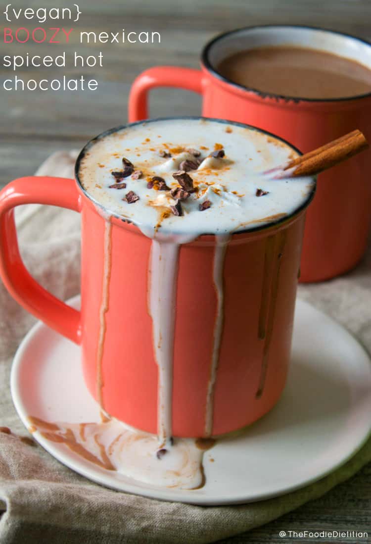 This vegan boozy Mexican spiced hot chocolate is perfect for a Valentine's Day date night or to get cozy with on any cold, blustery winter's night. Sweet, spicy and boozy. What more do you need? | @TheFoodieDietitian