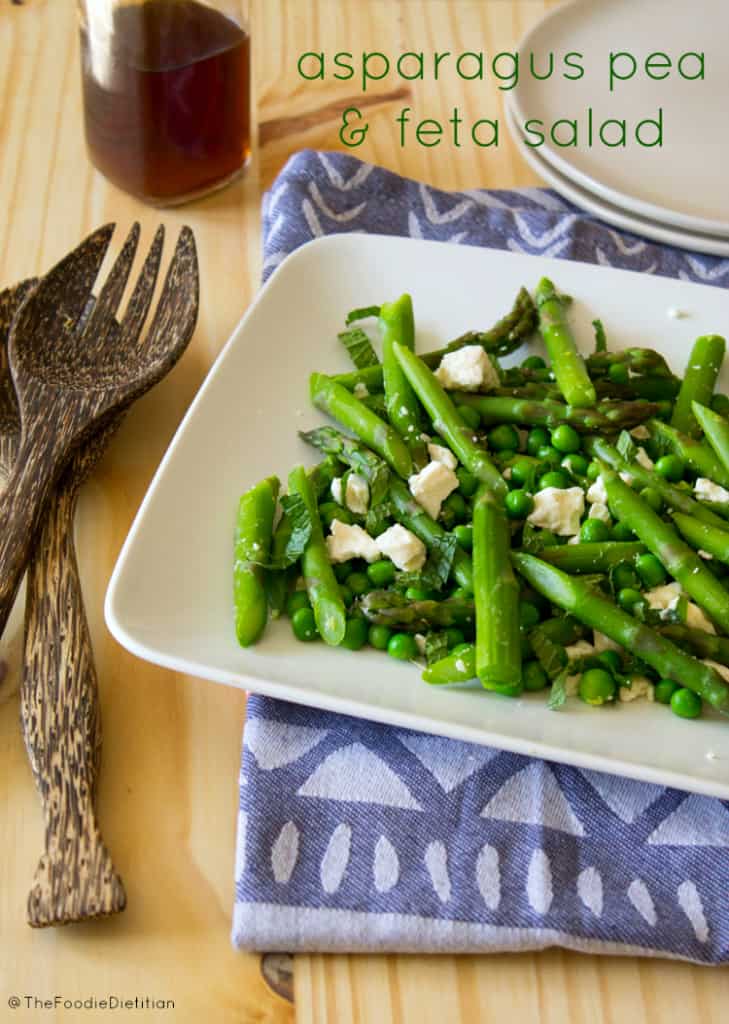 A light, refreshing salad for springtime - asparagus pea and feta salad with lemon balm vinegar and fresh mint. | @TheFoodieDietitian