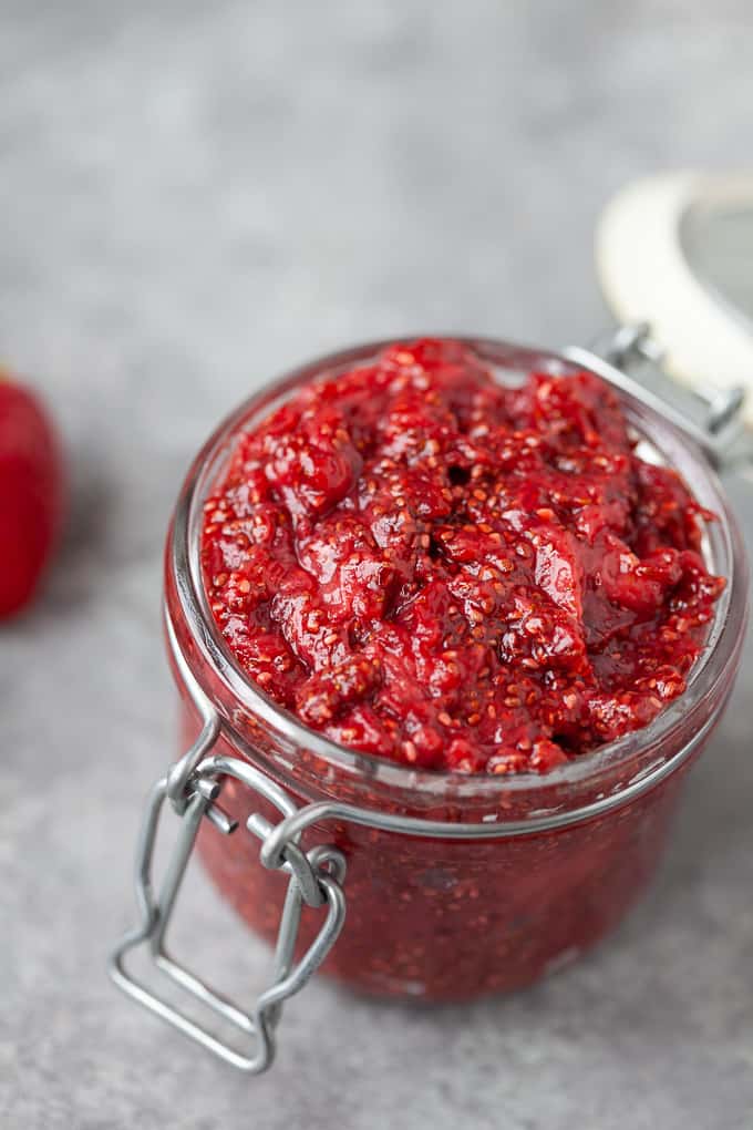 Textured strawberry chia jam in a glass jar