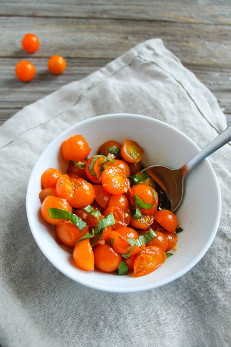 You know it's the end of summer when you eat tomato salad everyday. My Easy 5 Ingredient Tomato Salad takes less than 5 minutes to make. The perfect light and fresh end-of-summer appetizer. 