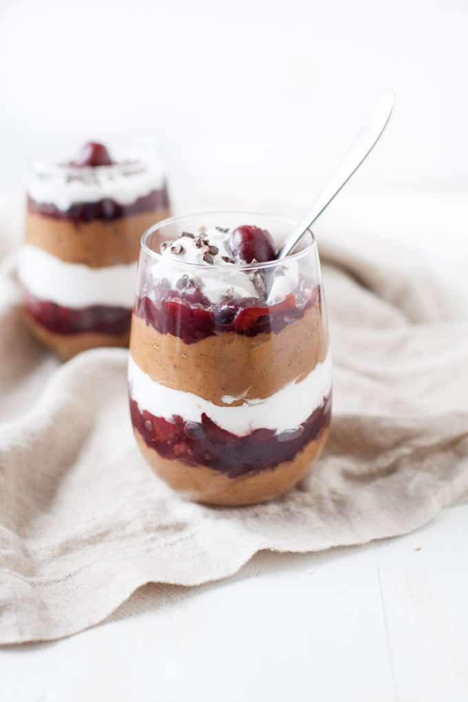 Black Forest Trifle layered in a glass jar with spoon