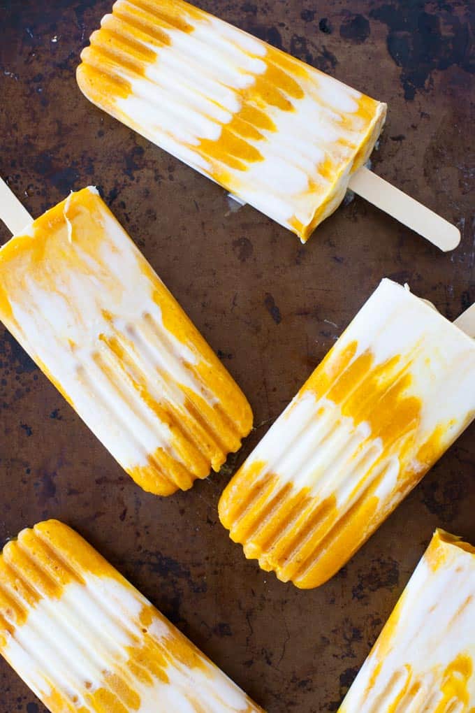 Sweet and creamy, these mango turmeric lassi popsicles are the perfect antioxidant-packed dessert.
