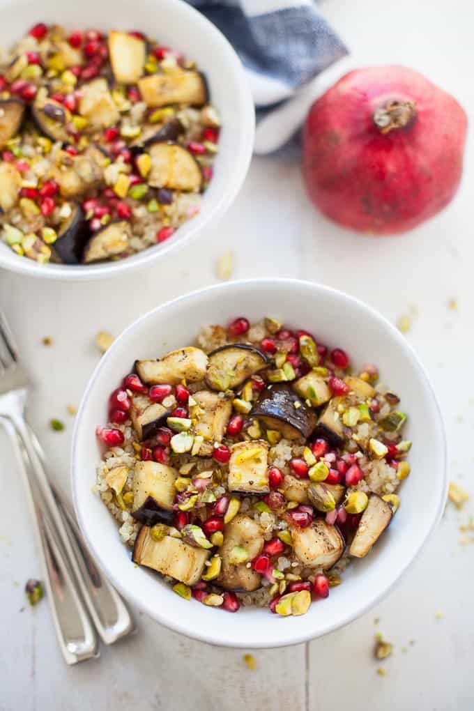 A flavorful, lightened up holiday side dish, this Middle Eastern spiced quinoa salad with eggplant and pomegranate is vegan gluten-free and sure to be enjoyed by all of your holiday guests!