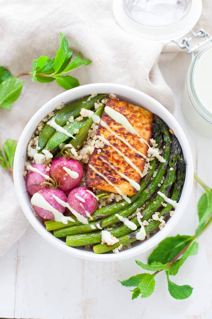 A delightfully refreshing and seasonal dish, this vegan-friendly spring vegetable buddha bowl is packed with seasonal veggies, tofu and a minty creamy cashew dressing. 