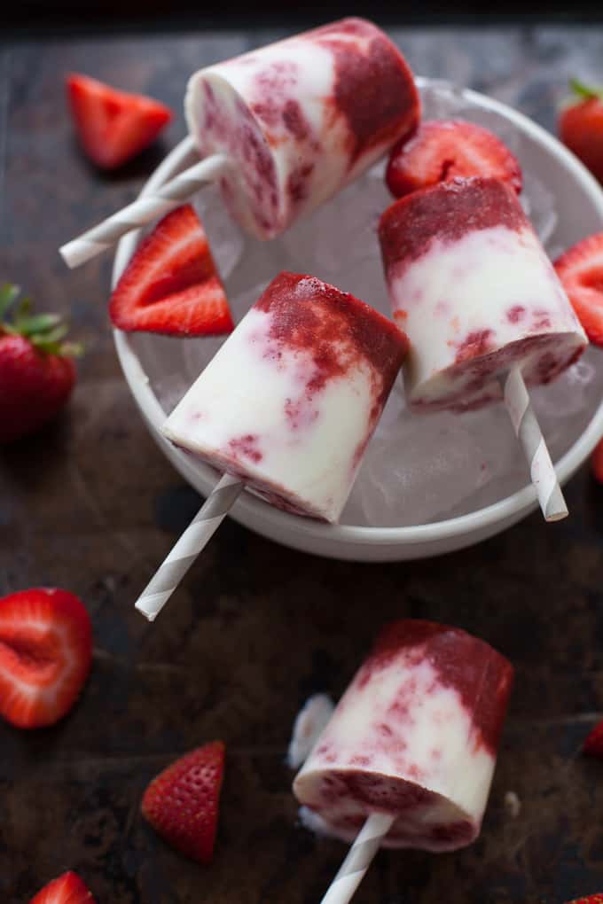 Such a fun, easy and delicious small bite dessert for the summer. These mini balsamic strawberry and cream popsicles are the perfect sweet treat for your next summer gathering!