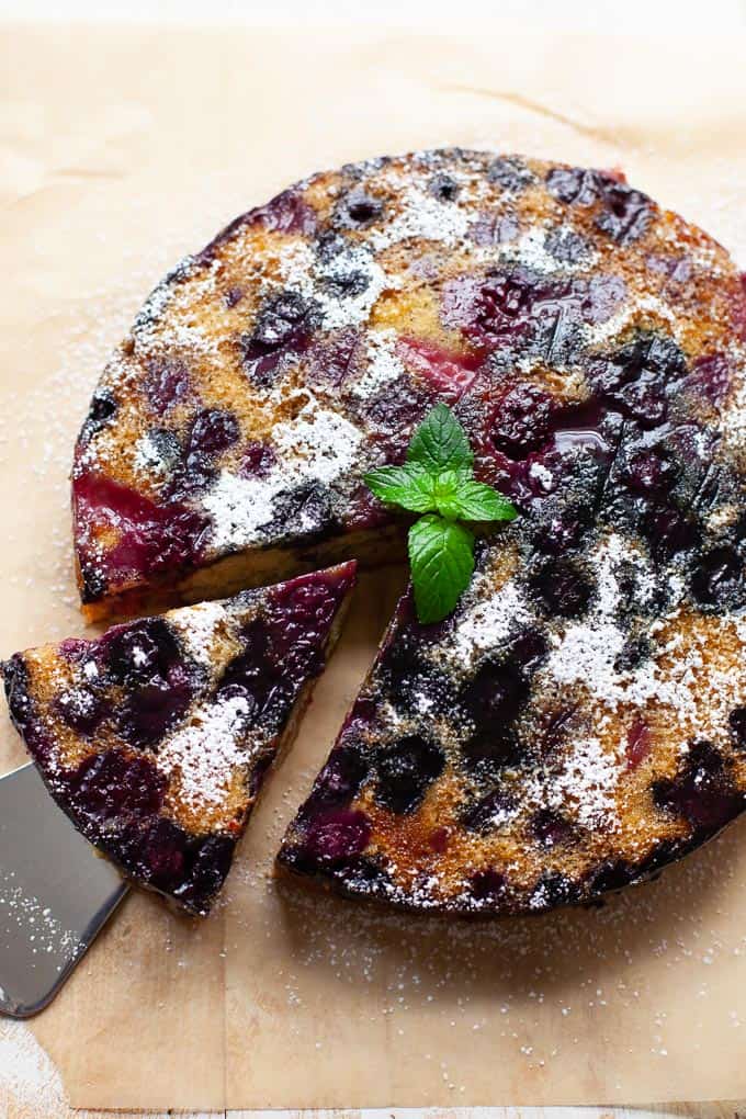 The perfect addition to your end-of-Summer gathering or companion to a cup of afternoon tea, this berry upside down cake is dense, spongy, and combines fresh flavors such as olive oil and mint into a sweet symphony.