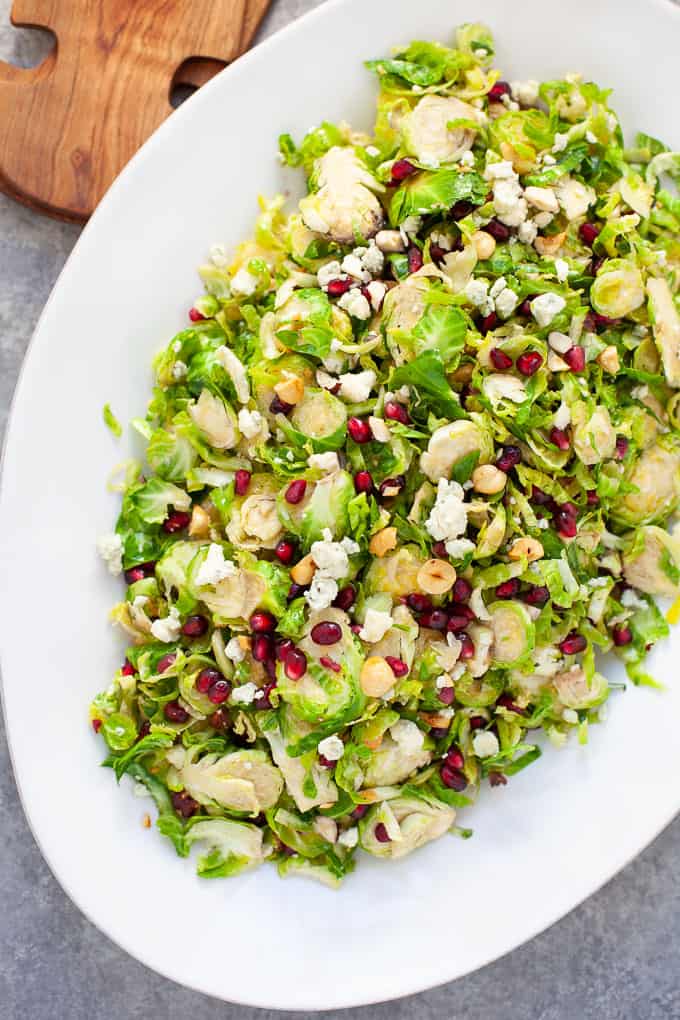 holiday shaved brussels sprout salad with pomegranate seeds and citrus dressing #holiday #salad