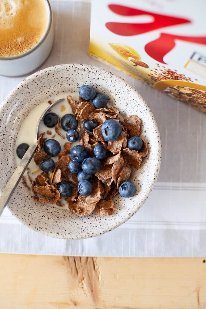 Bowl of cereal with fresh blueberries