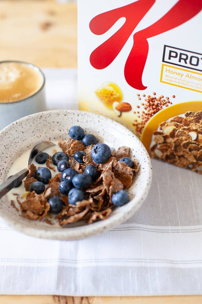 Bowl of cereal with fresh blueberries