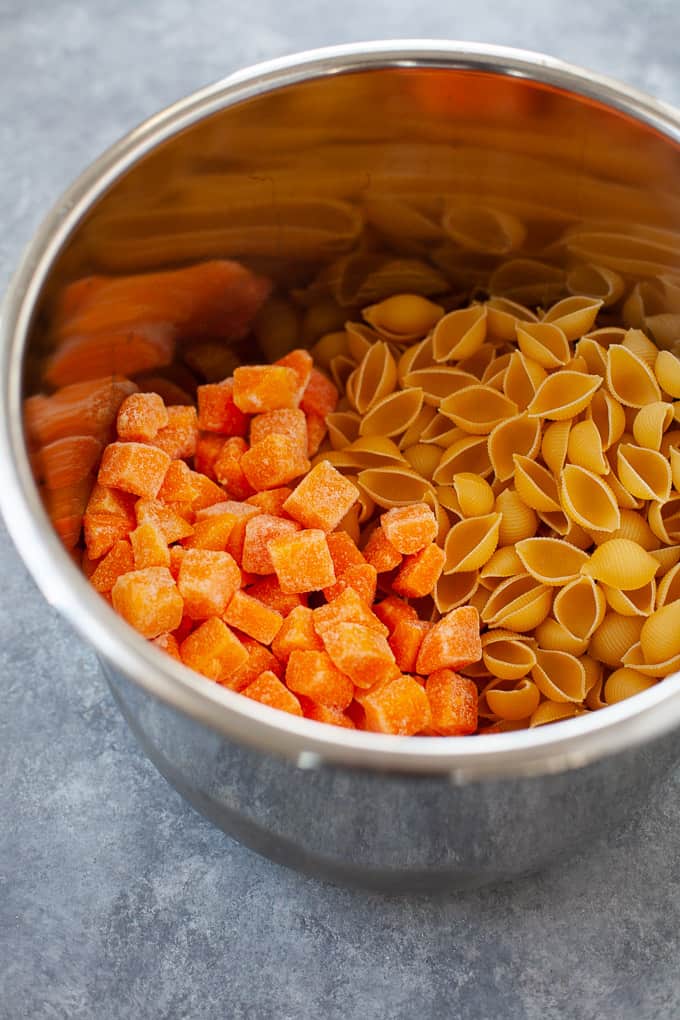 pasta shells and butternut squash in a dish