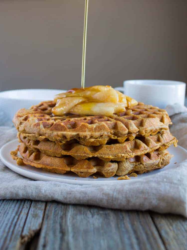 stack of three chai waffles with spiced pears on top