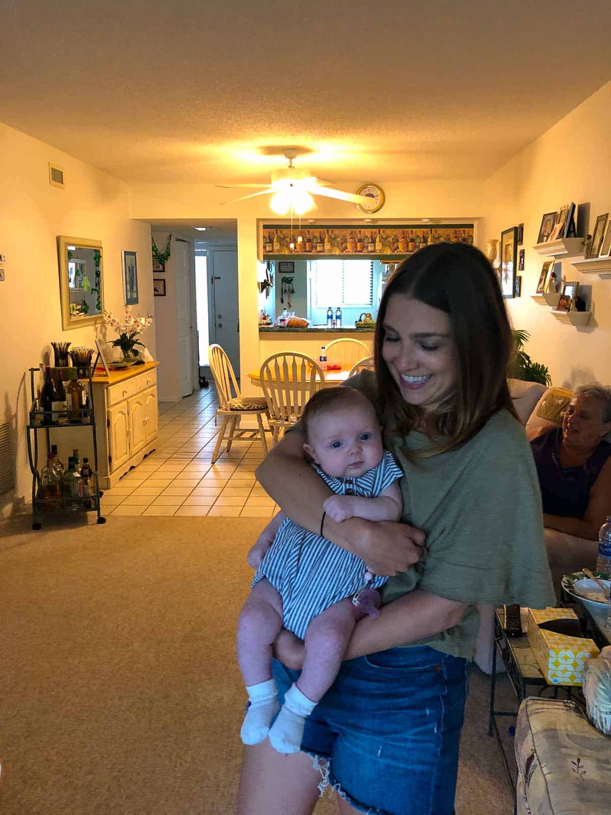 Kara holding her baby cousin