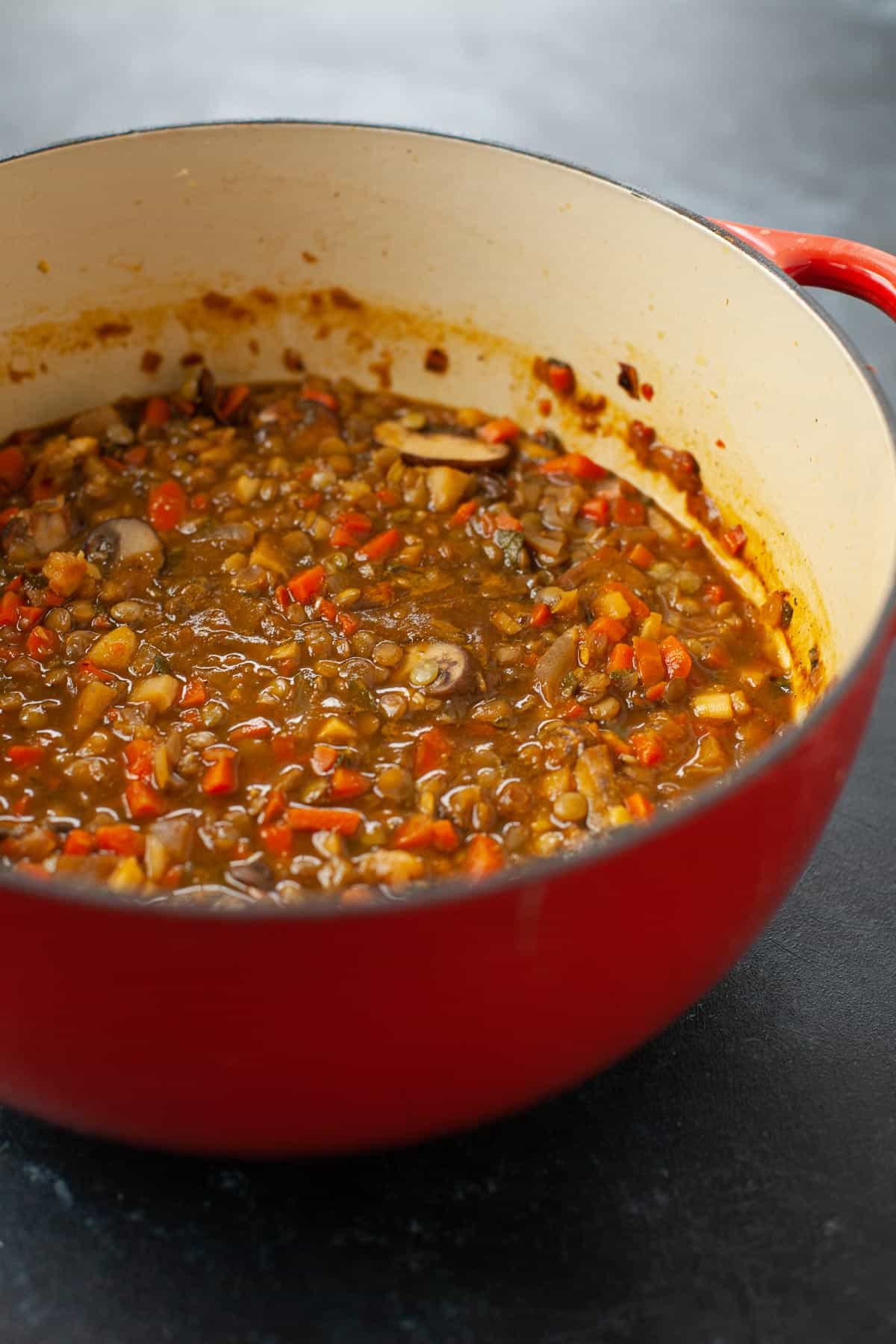 ingredients for vegan shepherd's pie mixed in a large pot