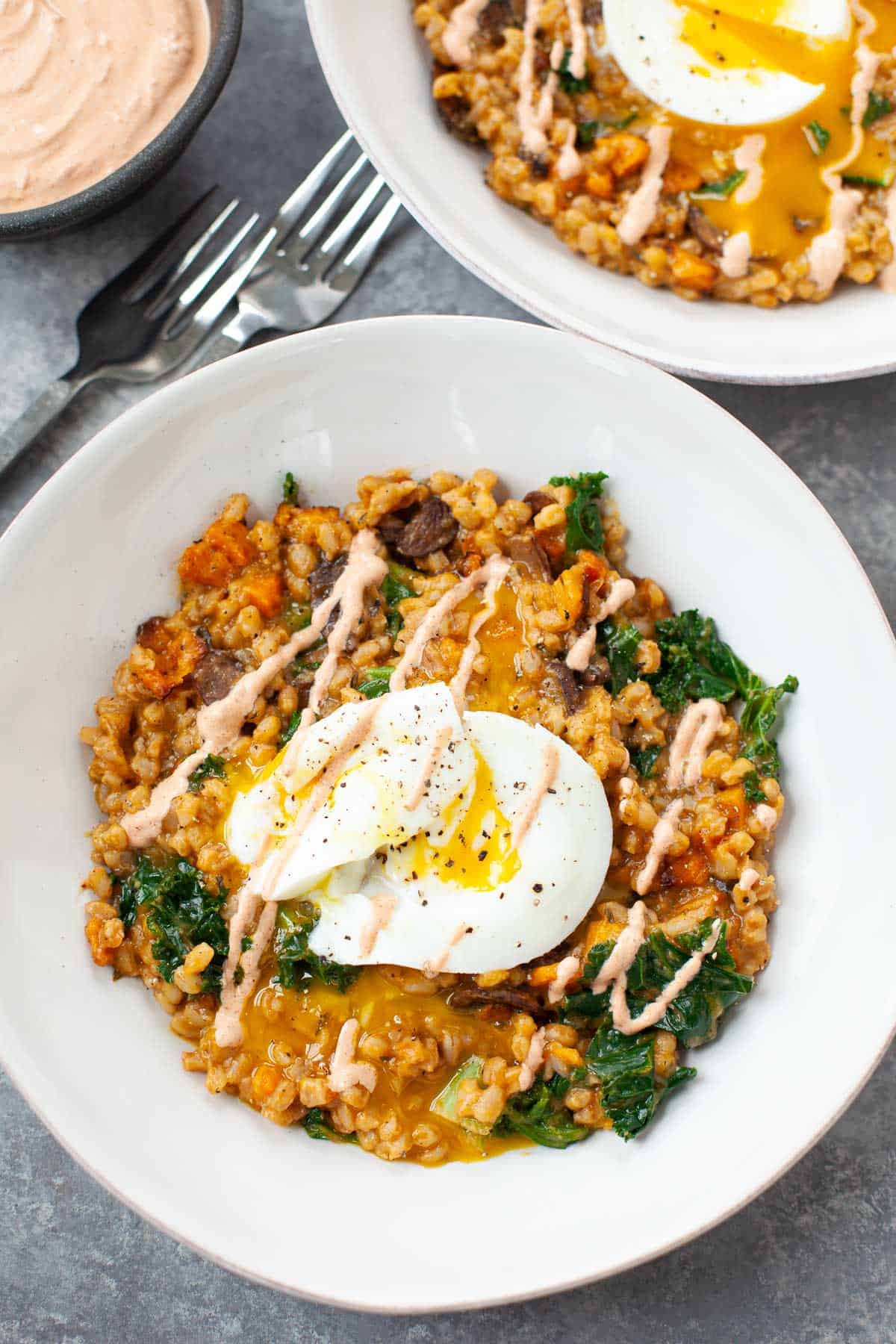 vegetarian farro breakfast bowl with poached egg