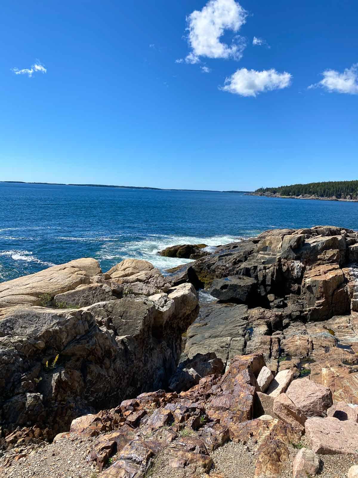 rocks along the edge of the ocean in Bar Harbor, Maine