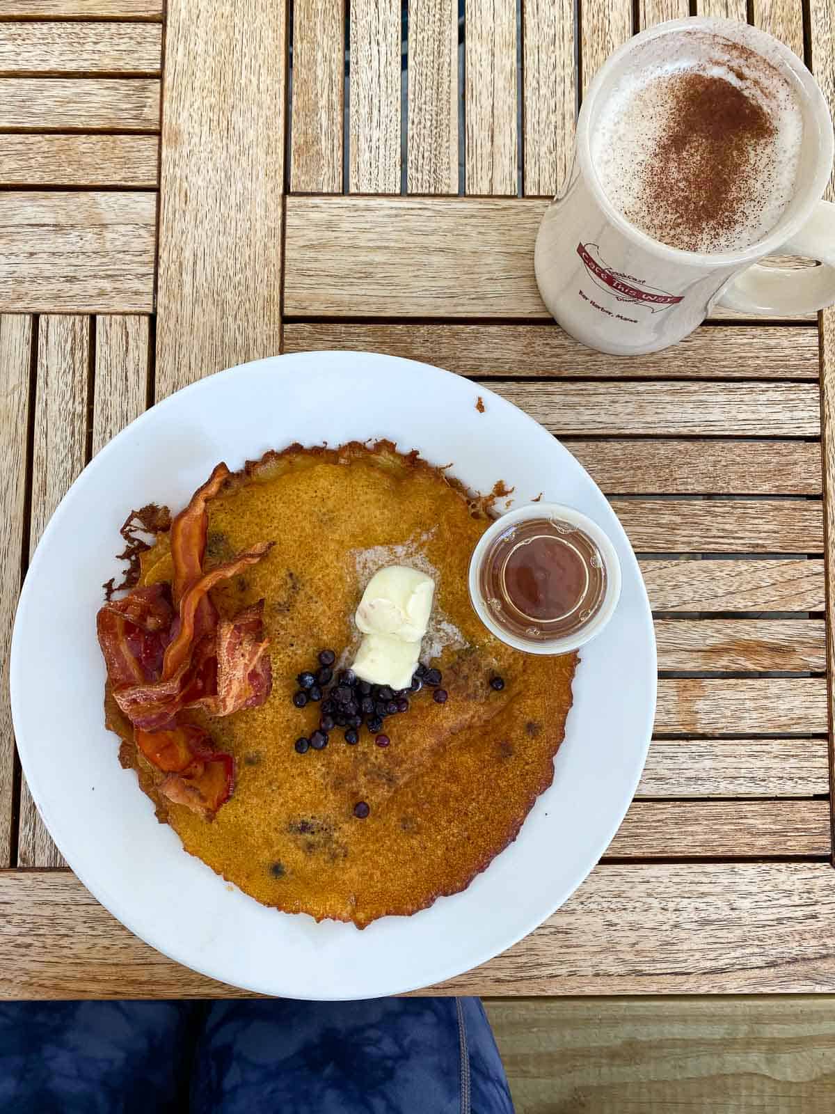 wild blueberry pancakes with bacon and coffee