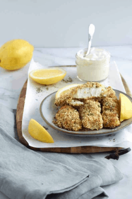 plate full of Fish Sticks with Honey Yogurt Dipping Sauce in a side bowl