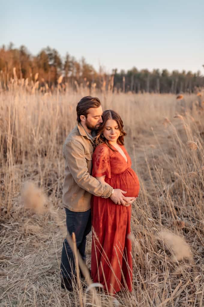 3rd trimester recap and recommendations kara lydon nutrition husband pregnancy photoshoot red dress new hampshire