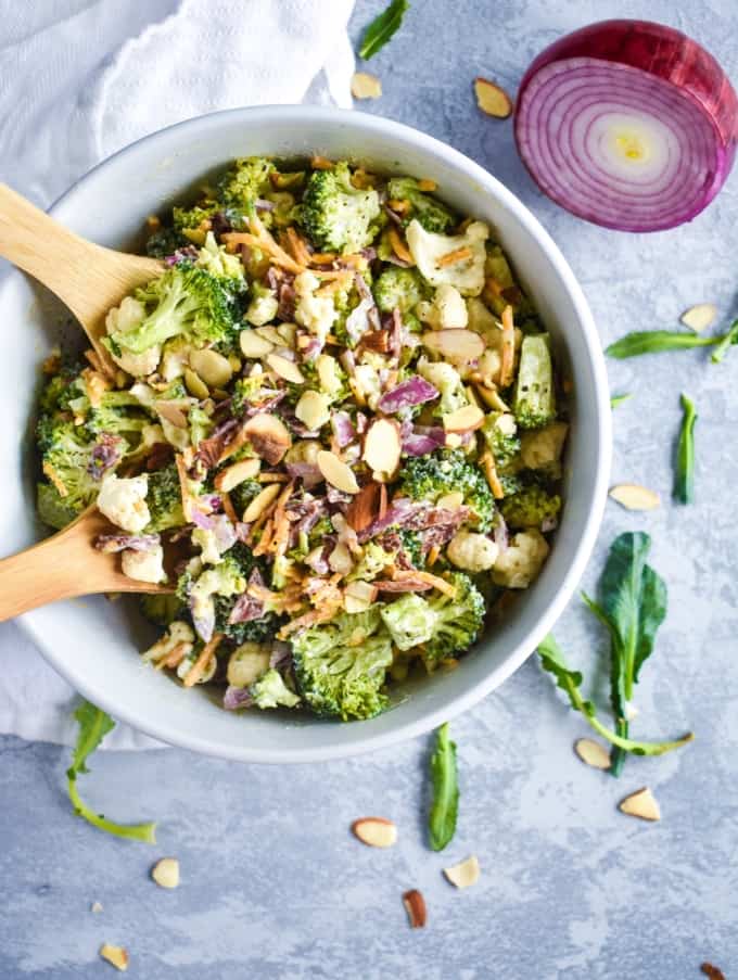 creamy broccoli and cauliflower salad with almonds and red onion