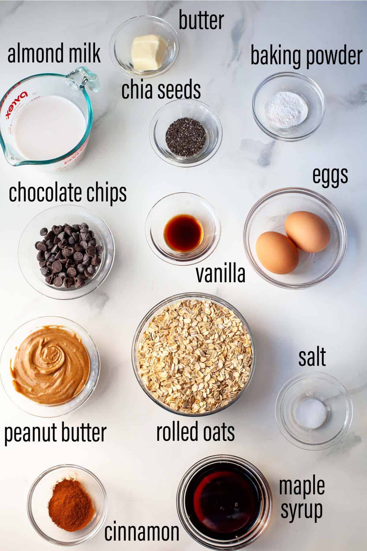 graphic of ingredients for baked oatmeal with peanut butter on a marble surface with black text