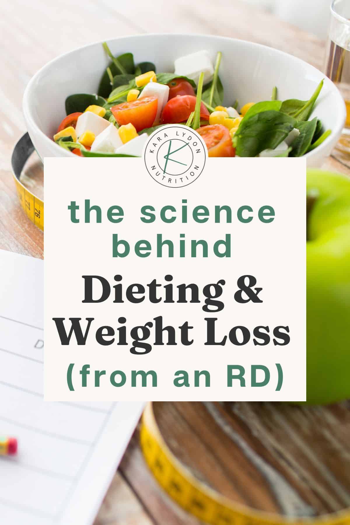 white salad bowl, green apple and measuring tape on wood table with text overlay the science behind dieting and weight loss (from an RD)
